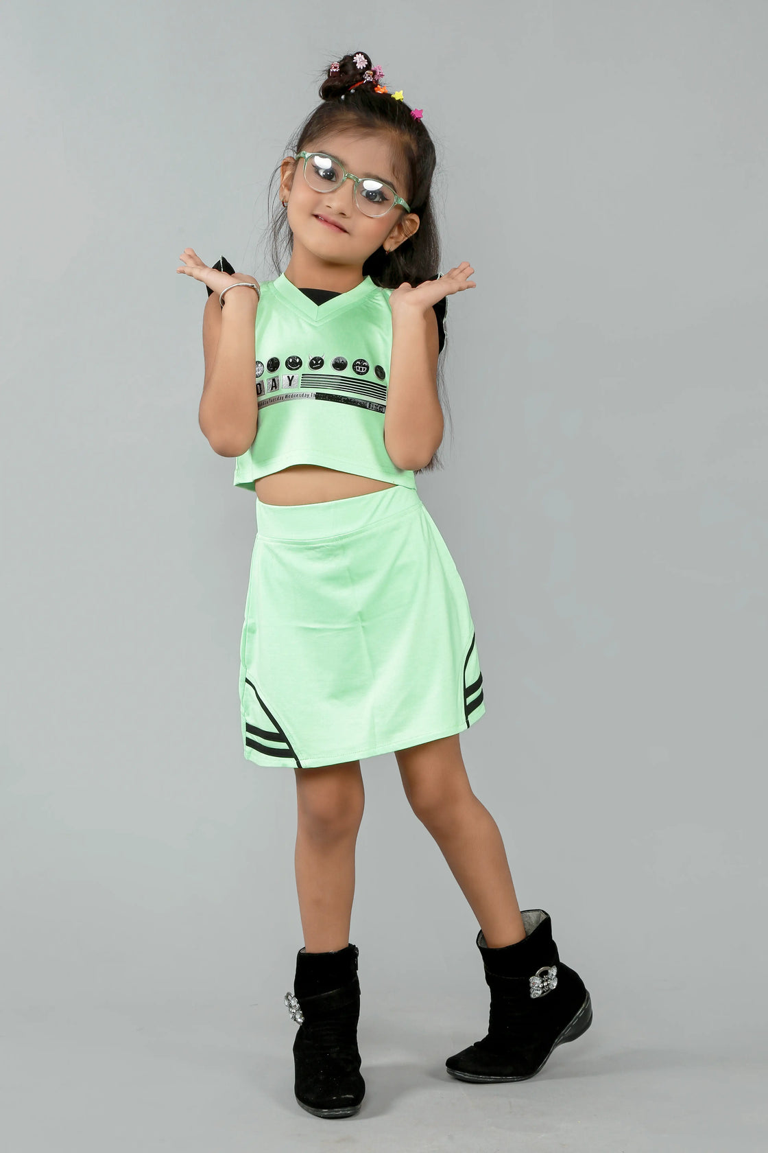 Eurynome Kidswear Girls – Emoji Tennis Skirt & Top, sport-ready set with daily smileys, frill sleeves, and bold black highlights for athletic play ages 3-9.