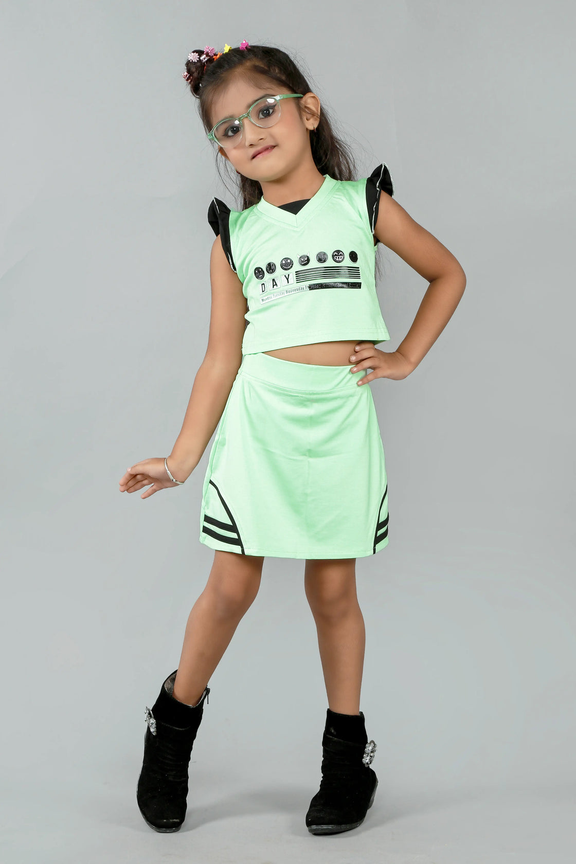 Eurynome Kidswear Girls – Emoji Tennis Skirt & Top, sport-ready set with daily smileys, frill sleeves, and bold black highlights for athletic play ages 3-9.