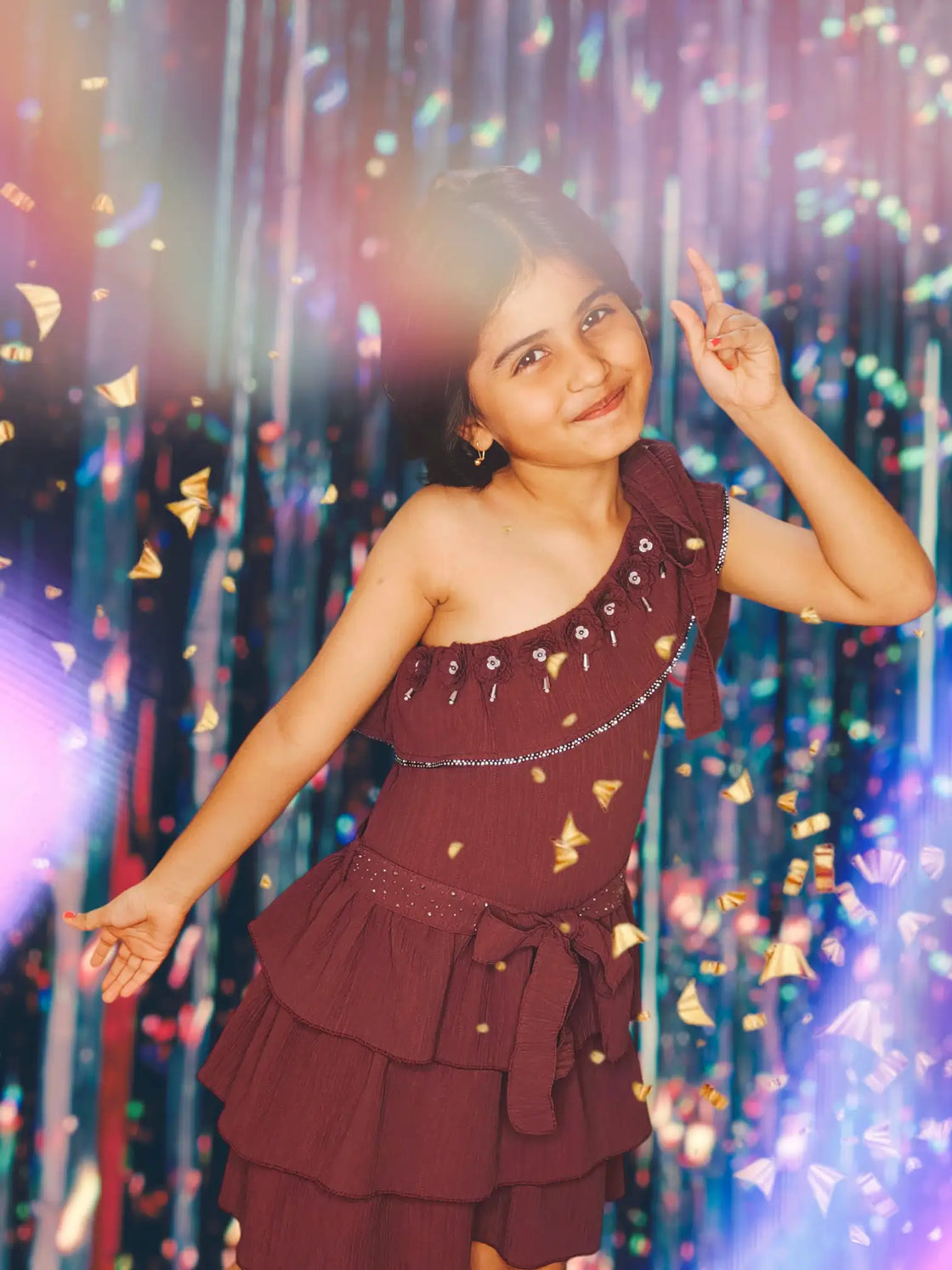 Eurynome Kidswear Girls—A super-luxe, princess-inspired masterpiece: hand-crafted floral accents, shimmering accessories, and a silver-studded belt bring royal elegance to every tier. Truly a queen’s dress for ages 3–9