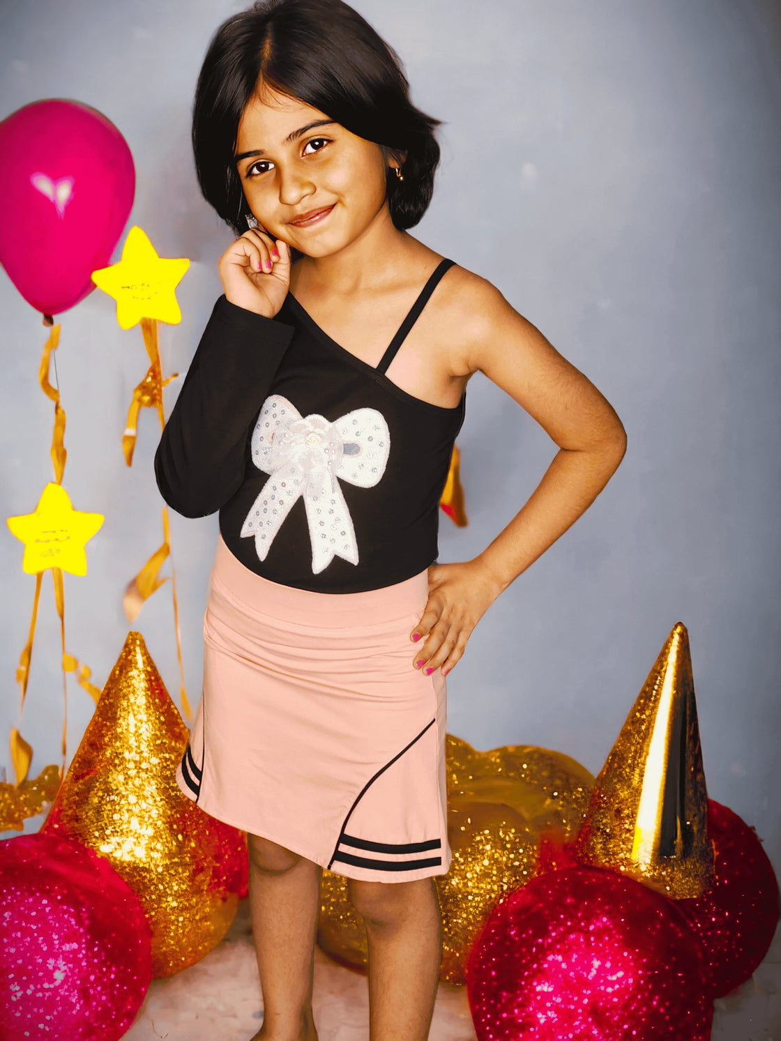 Eurynome Kidswear Girls—Single-shoulder cotton top with a handmade princess crown accent and pastel designer skirt. Luxe, soft, and distinctly stylish, Ages 3-9