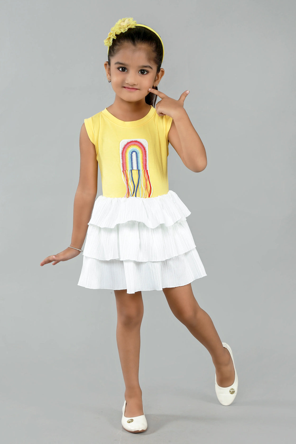 Eurynome Kidswear Girls—Super soft tencel top with hand-crocheted rainbow, paired with a striking white multi-flair skirt. Vibrant, breezy, and perfect for outdoors ages 1–9