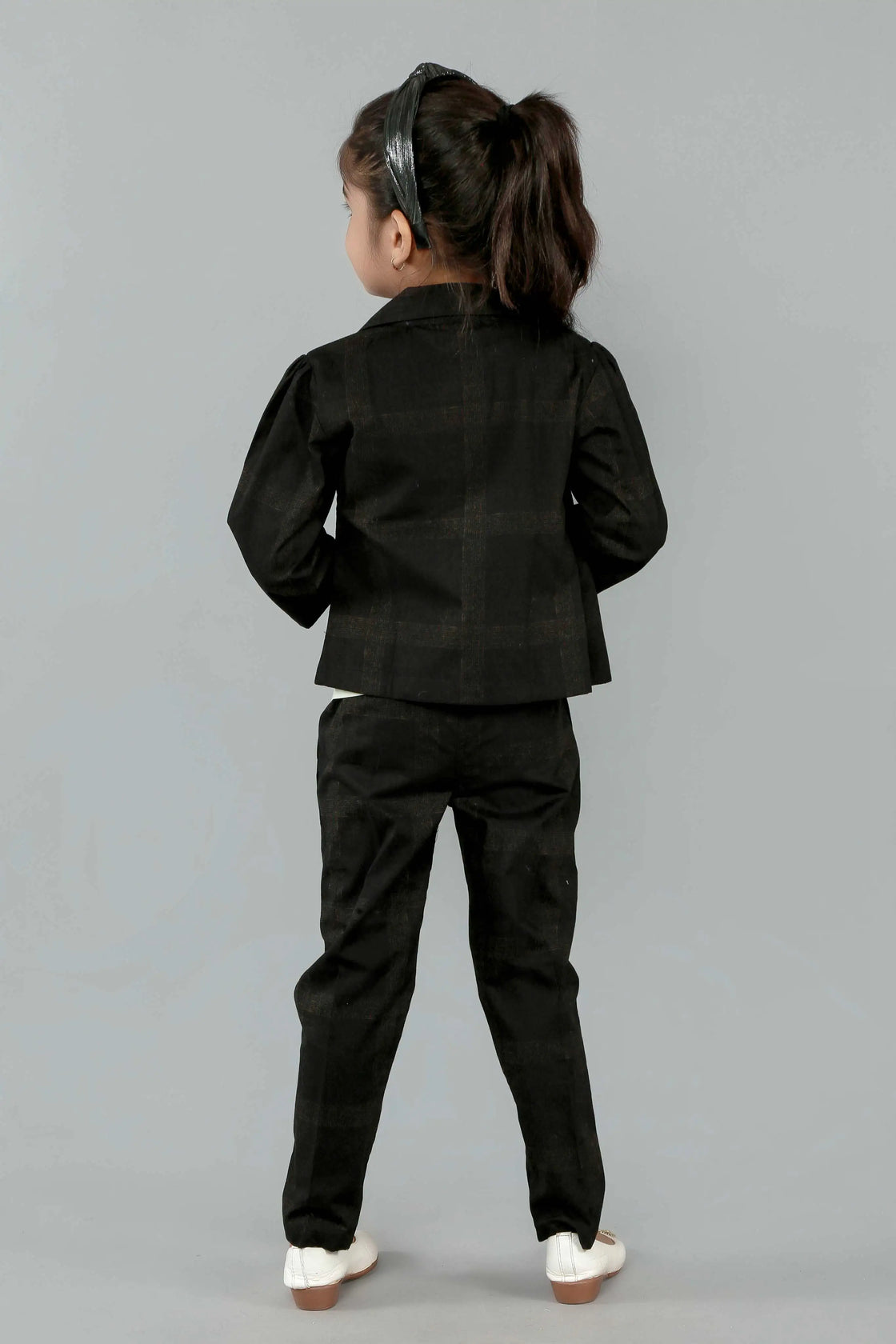 Eurynome Kidswear Girls—MIDNIGHT Black Rose series features a handmade center rose, crafting a bold, simple, and powerful noir statement for ages 3–9 .