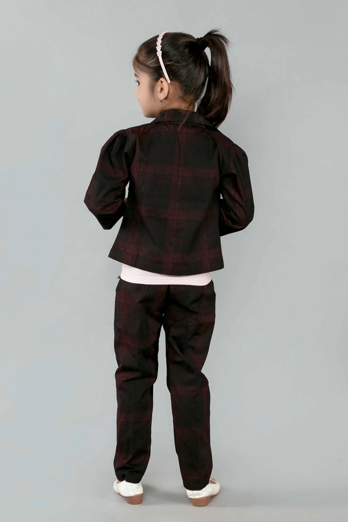 Eurynome Kidswear Girls—MIDNIGHT Black Rose series features a handmade center rose, crafting a bold, simple, and powerful noir statement for ages 3–9