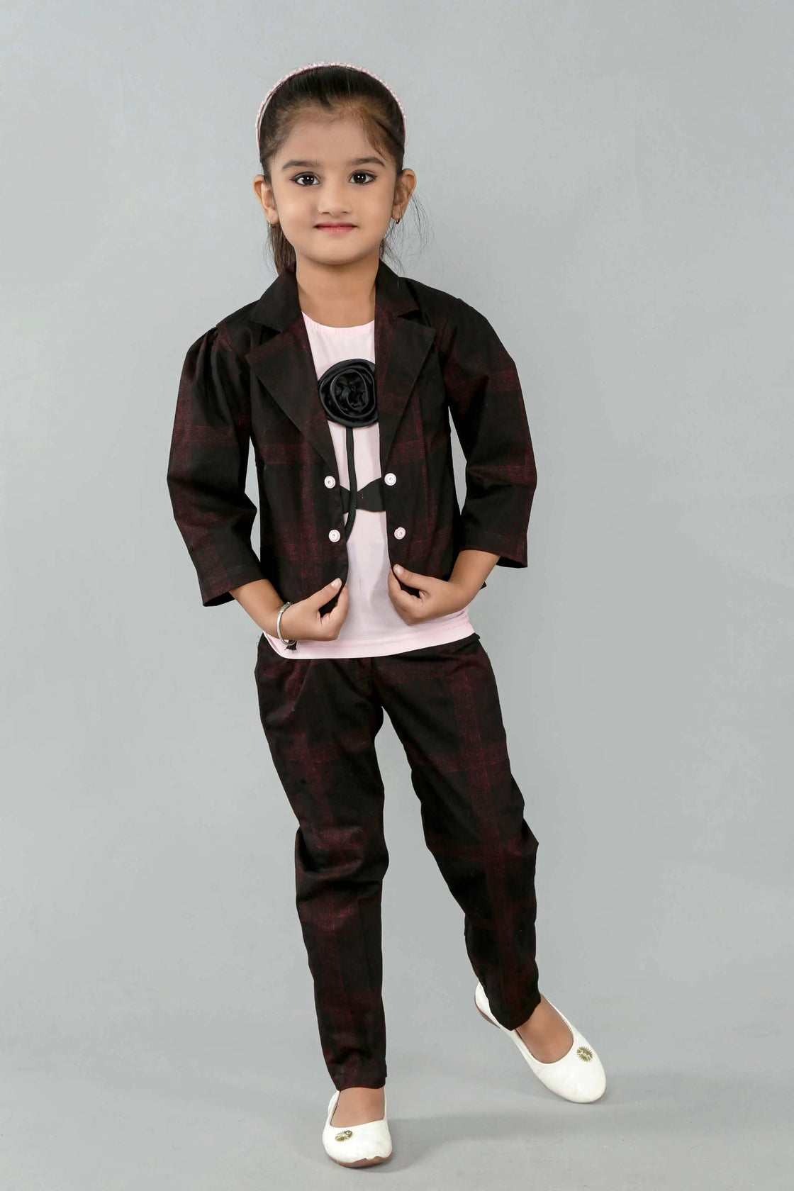 Eurynome Kidswear Girls—MIDNIGHT Black Rose series features a handmade center rose, crafting a bold, simple, and powerful noir statement for ages 3–9