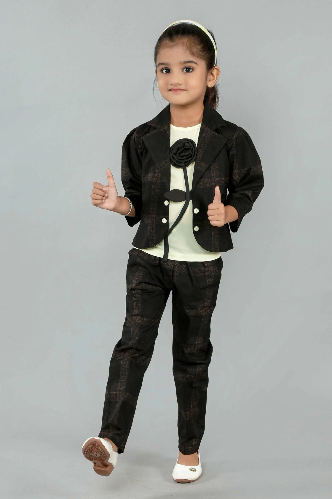 Eurynome Kidswear Girls—MIDNIGHT Black Rose series features a handmade center rose, crafting a bold, simple, and powerful noir statement for ages 3–9