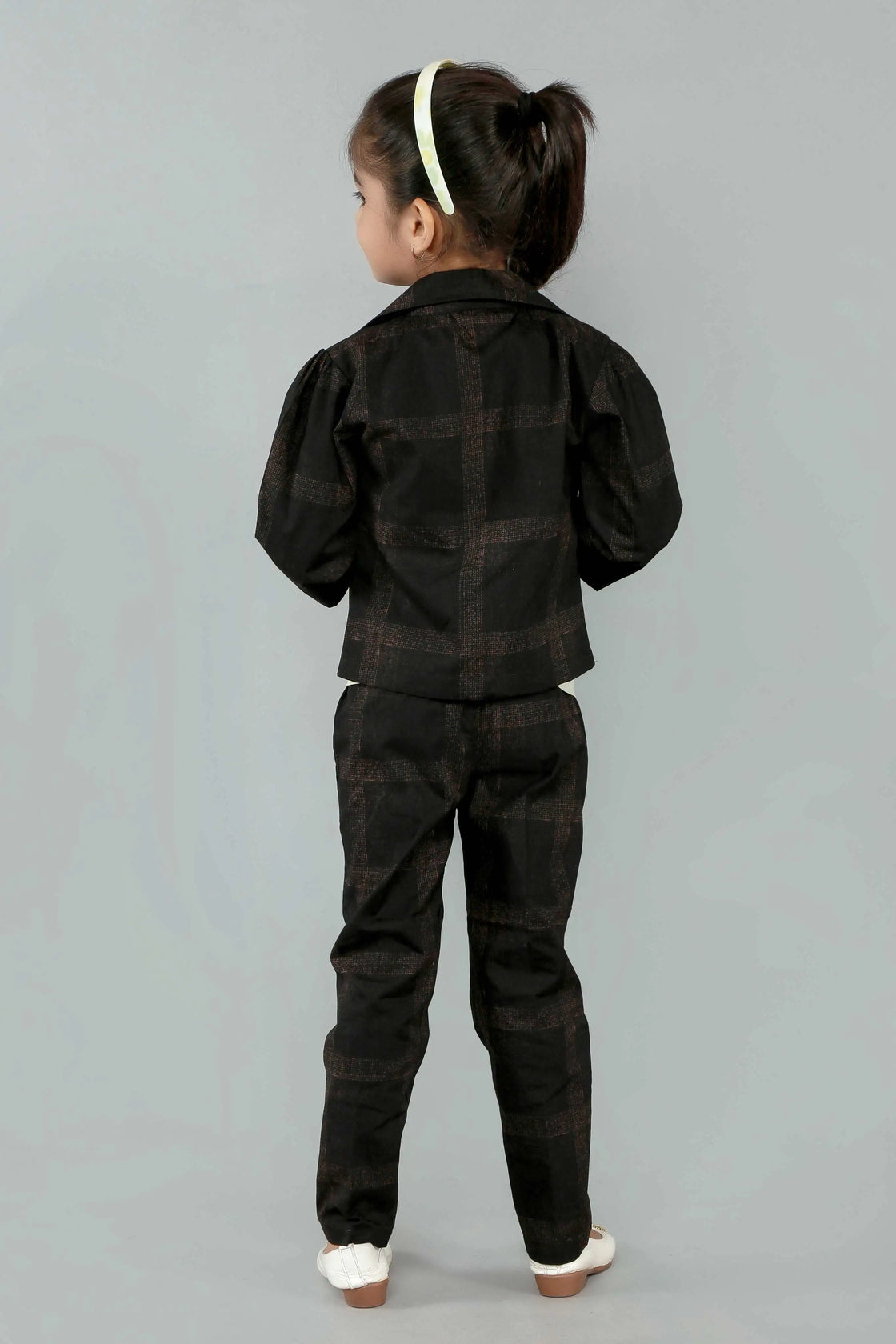 Eurynome Kidswear Girls—MIDNIGHT Black Rose series features a handmade center rose, crafting a bold, simple, and powerful noir statement for ages 3–9