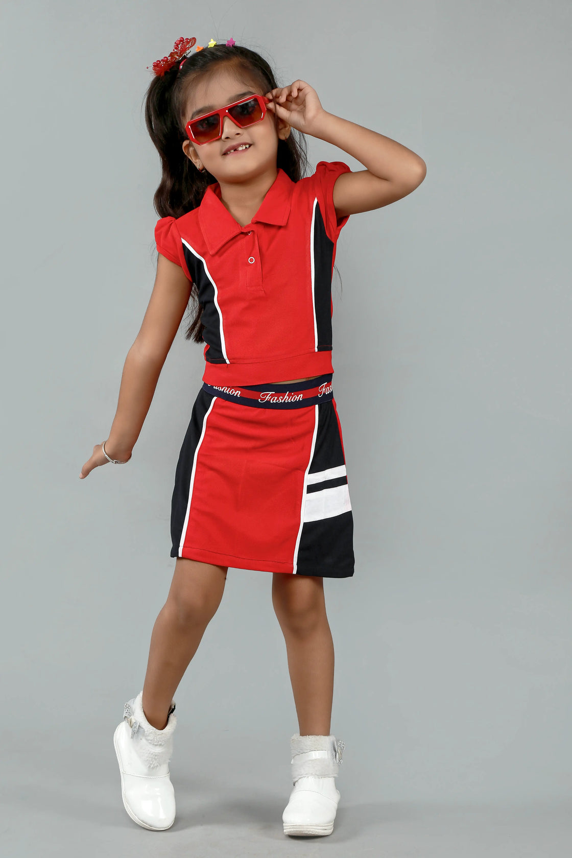 Eurynome Kidswear Girls – Game, set, match! Sporty tennis skirt & top set, with bold stripes, court-ready fit, and quilted cotton comfort for active stars ages 3-9.