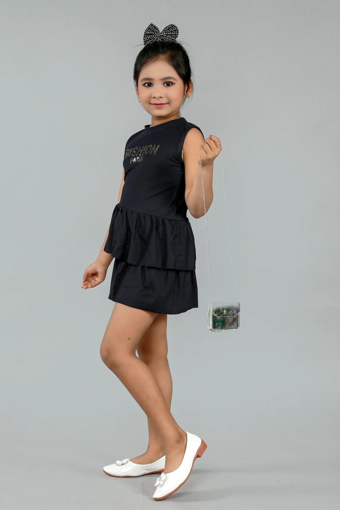 Eurynome Kidswear Girls – Spin, shine, and play in our Premier Red Quilted Frock! Paris chic meets kid's fun with shiny gold-silver details, double-layered frills, playful silver sling bag—ready for every little fashionista, ages 3-9.