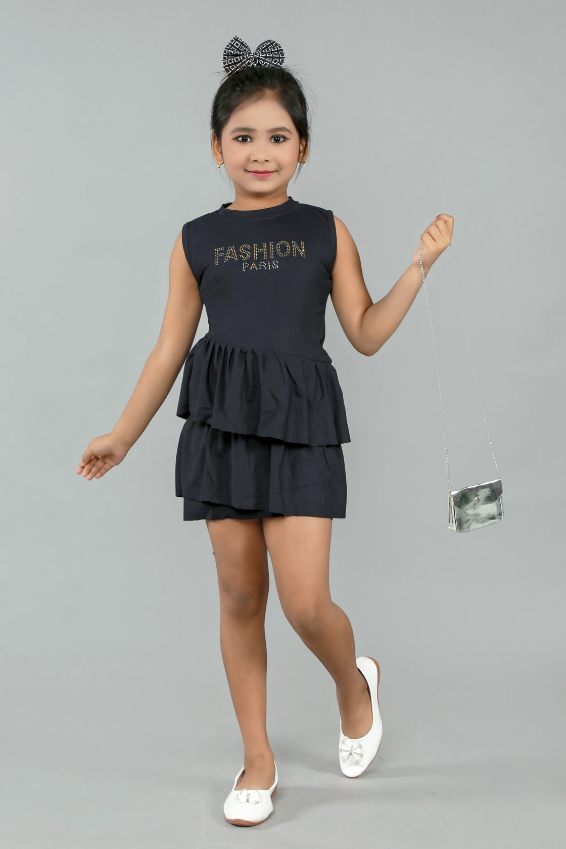 Eurynome Kidswear Girls – Spin, shine, and play in our Premier Red Quilted Frock! Paris chic meets kid's fun with shiny gold-silver details, double-layered frills, playful silver sling bag—ready for every little fashionista, ages 3-9.