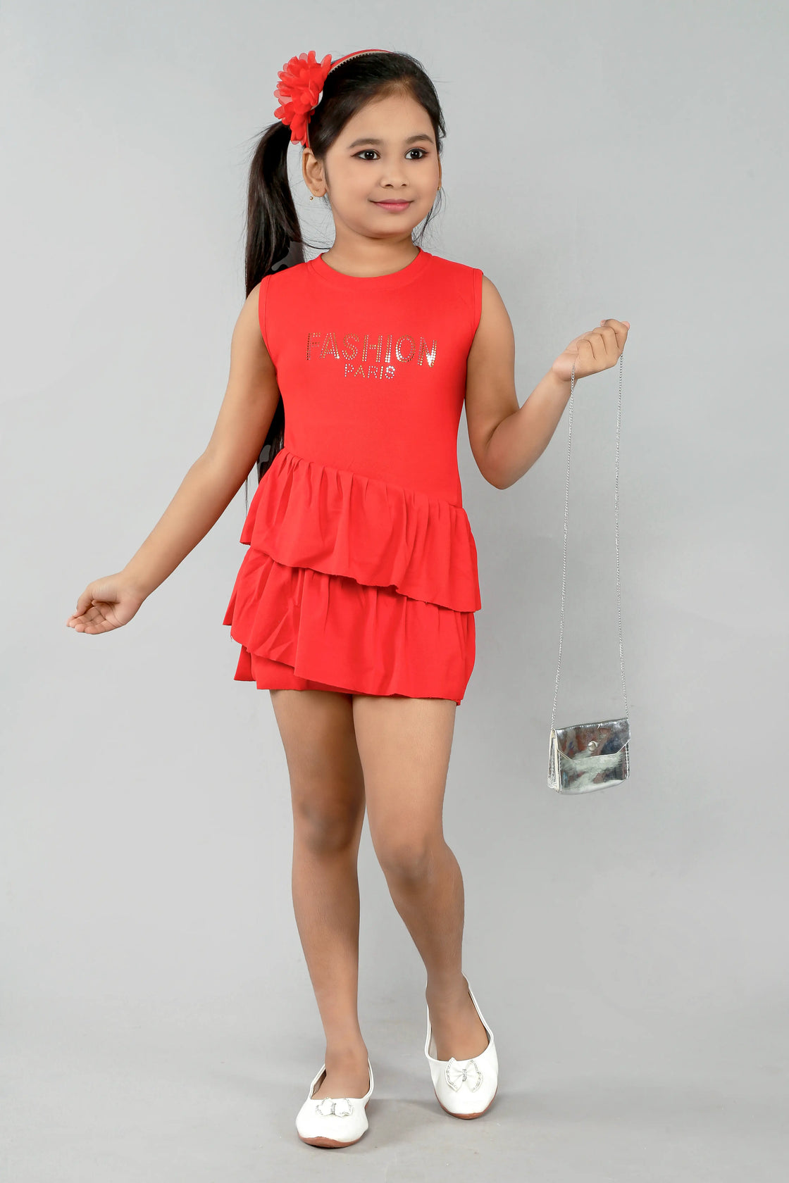 Eurynome Kidswear Girls – Spin, shine, and play in our Premier Red Quilted Frock! Paris chic meets kid's fun with shiny gold-silver details, double-layered frills, playful silver sling bag—ready for every little fashionista, ages 3-9.