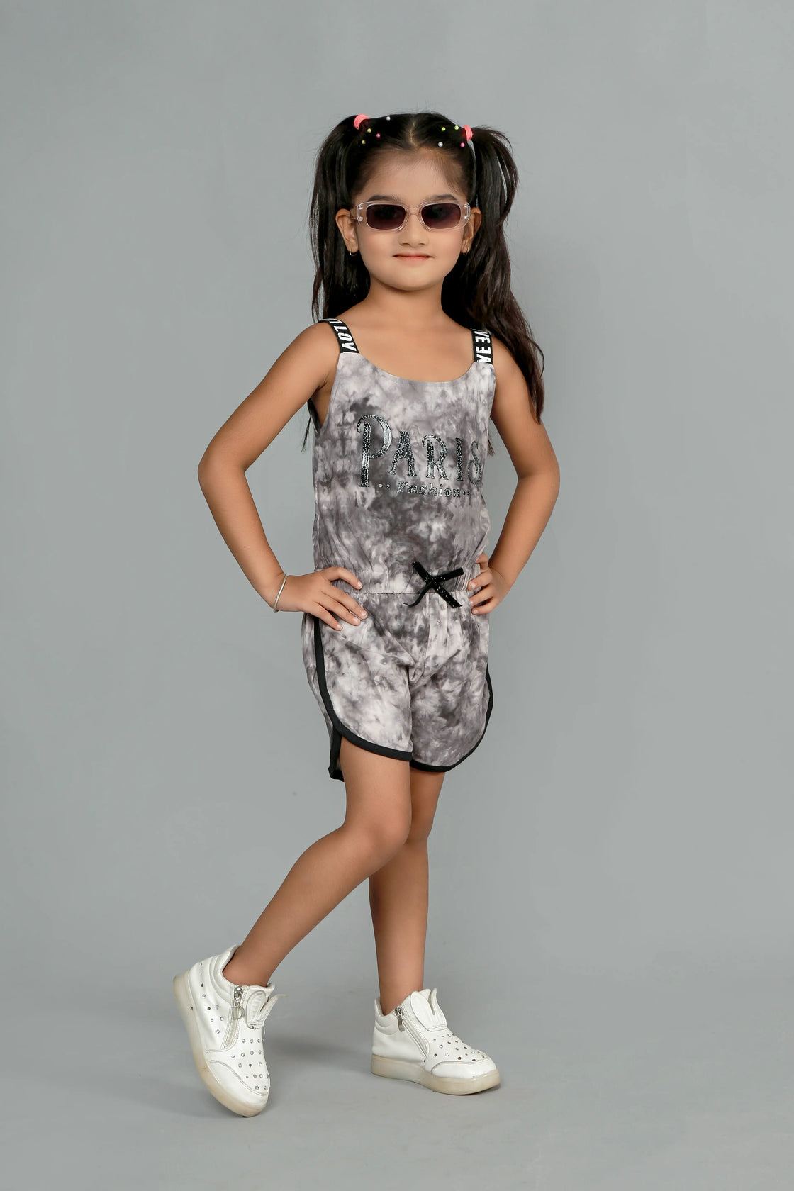 Eurynome Kidswear Girls – Tie Dye Paris Romper, Soft cotton, love lace straps, chic bow, adventure-ready fit. Ages 3-6