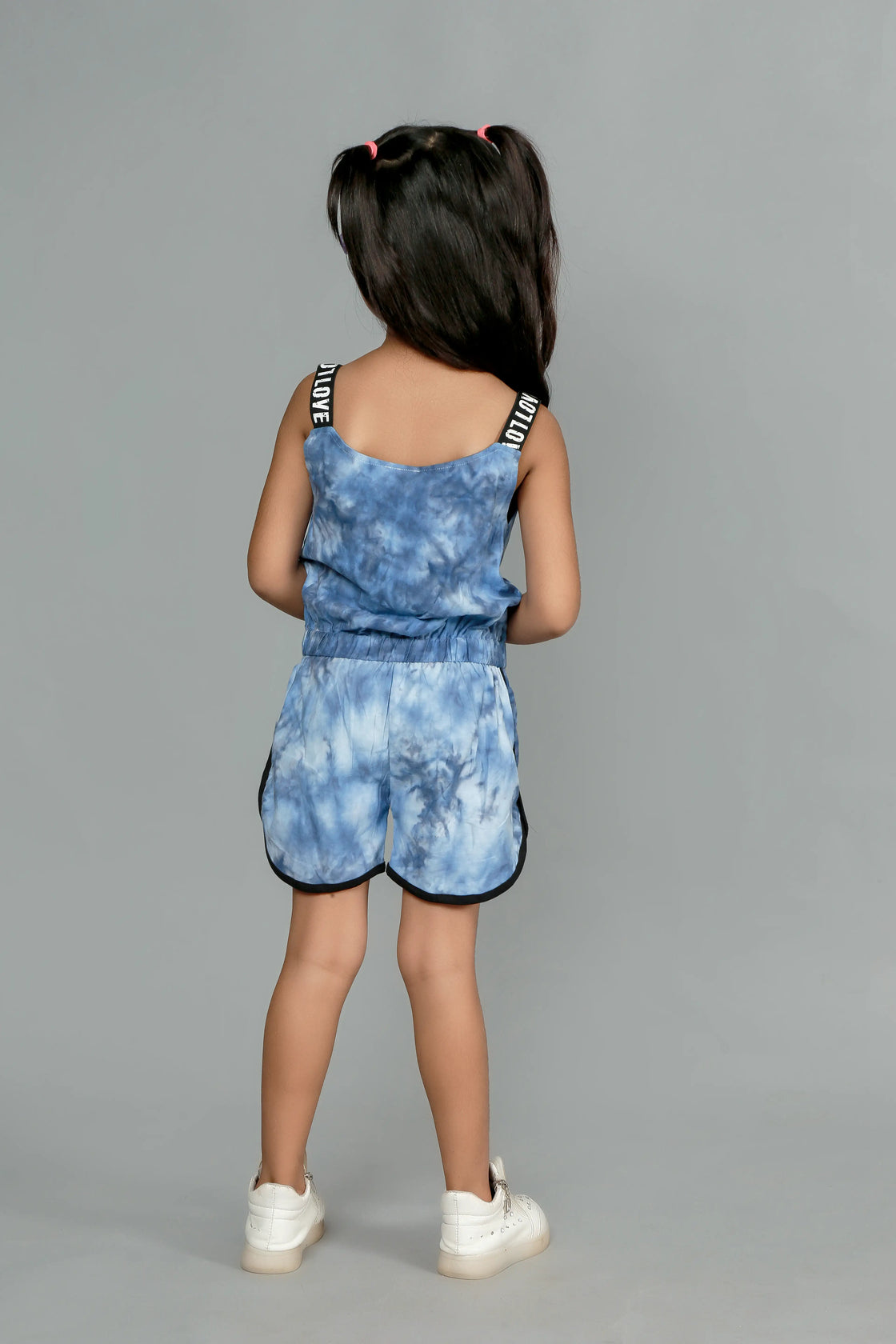 Eurynome Kidswear Girls – Tie Dye Paris Romper, Soft cotton, love lace straps, chic bow, adventure-ready fit. Ages 3-6