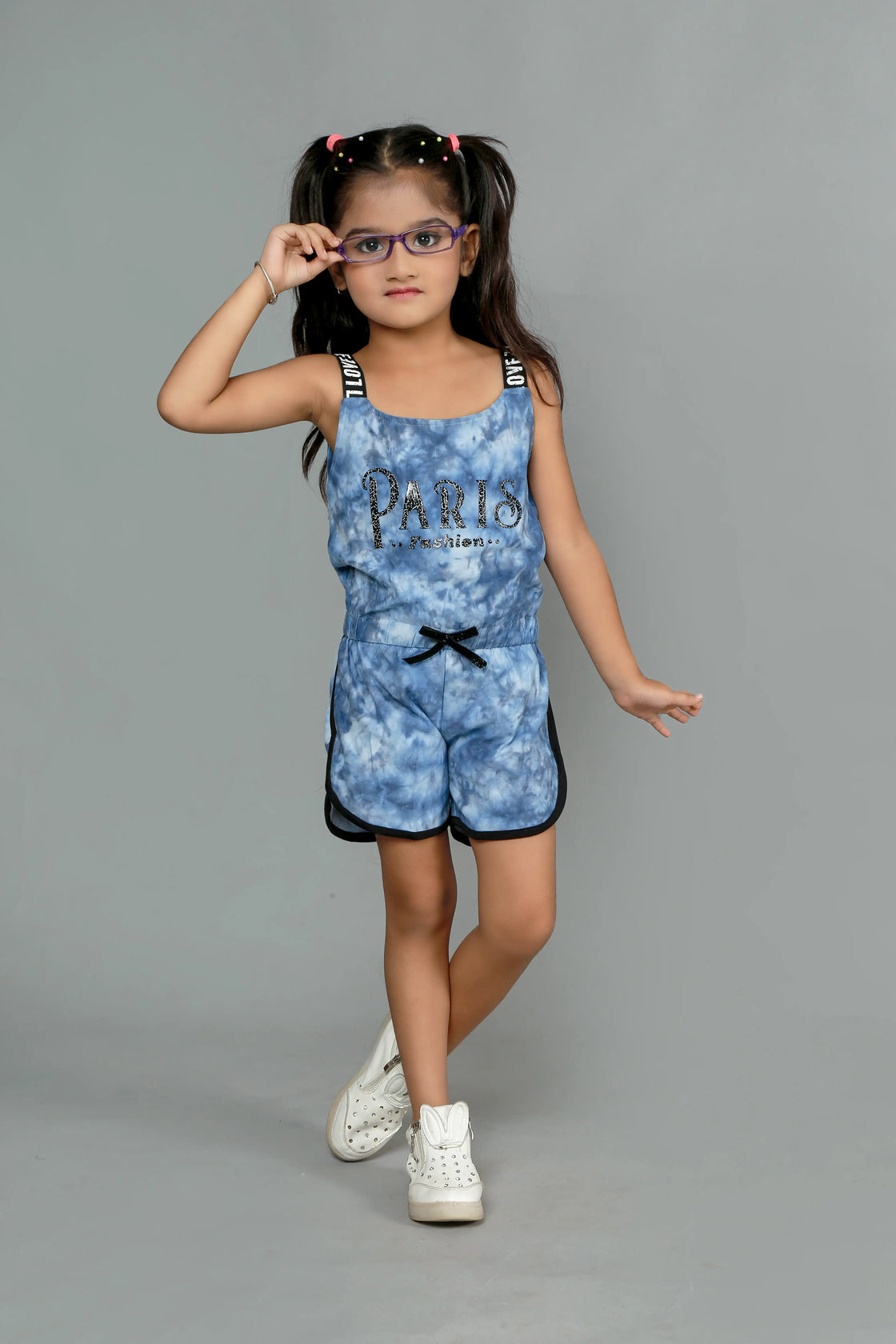 Eurynome Kidswear Girls – Tie Dye Paris Romper, Soft cotton, love lace straps, chic bow, adventure-ready fit. Ages 3-6