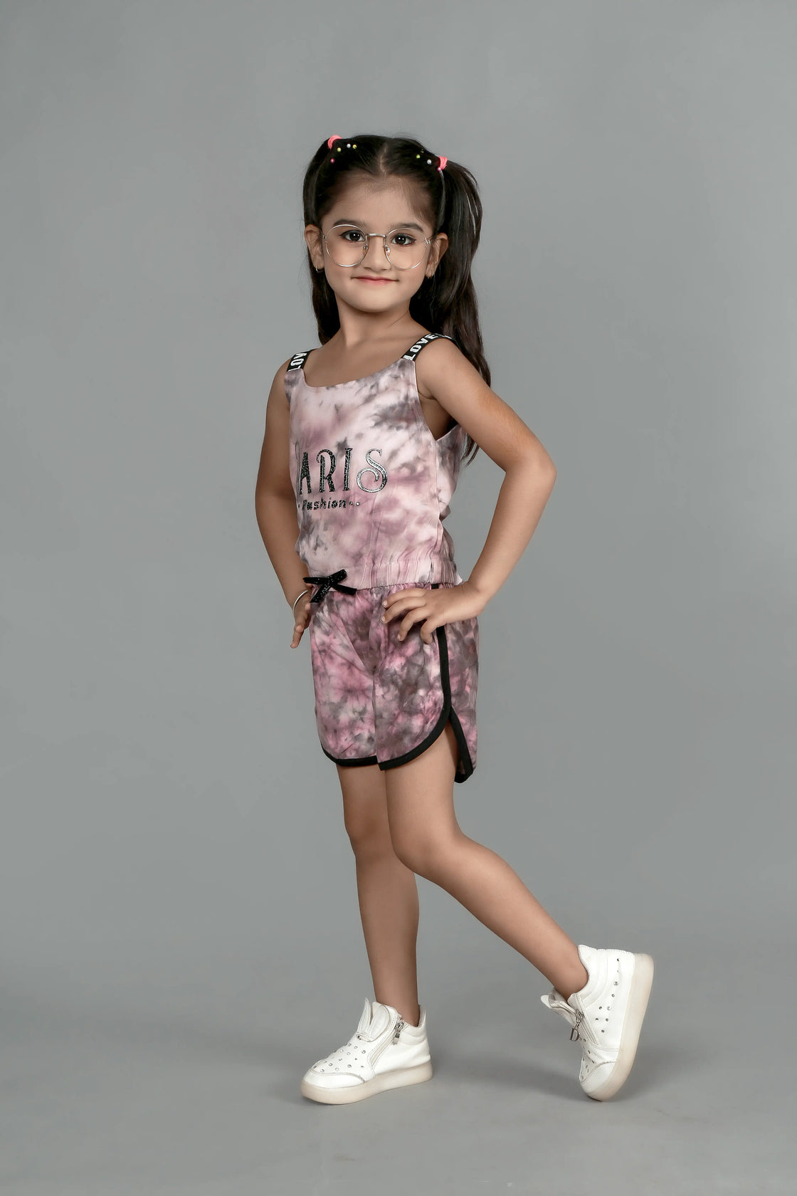 Eurynome Kidswear Girls – Tie Dye Paris Romper, Soft cotton, love lace straps, chic bow, adventure-ready fit. Ages 3-6